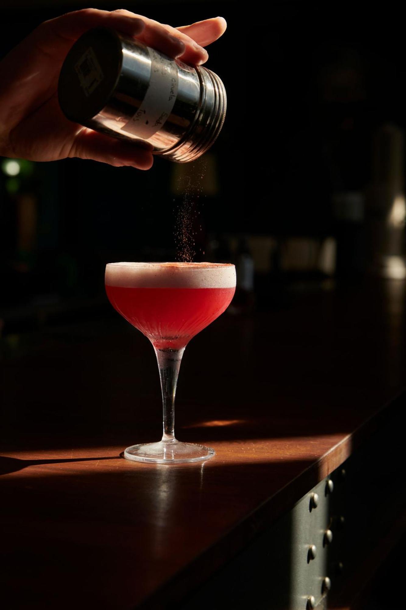 The Click Clack Hotel Medellin Ngoại thất bức ảnh A Clover Club cocktail being garnished with ground nutmeg